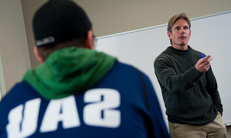 student and professor in classroom